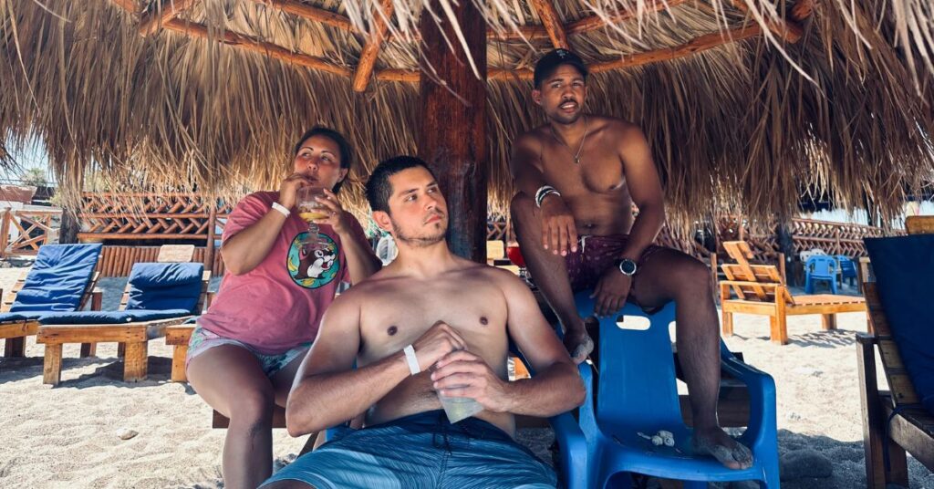 newly weds and friend posing