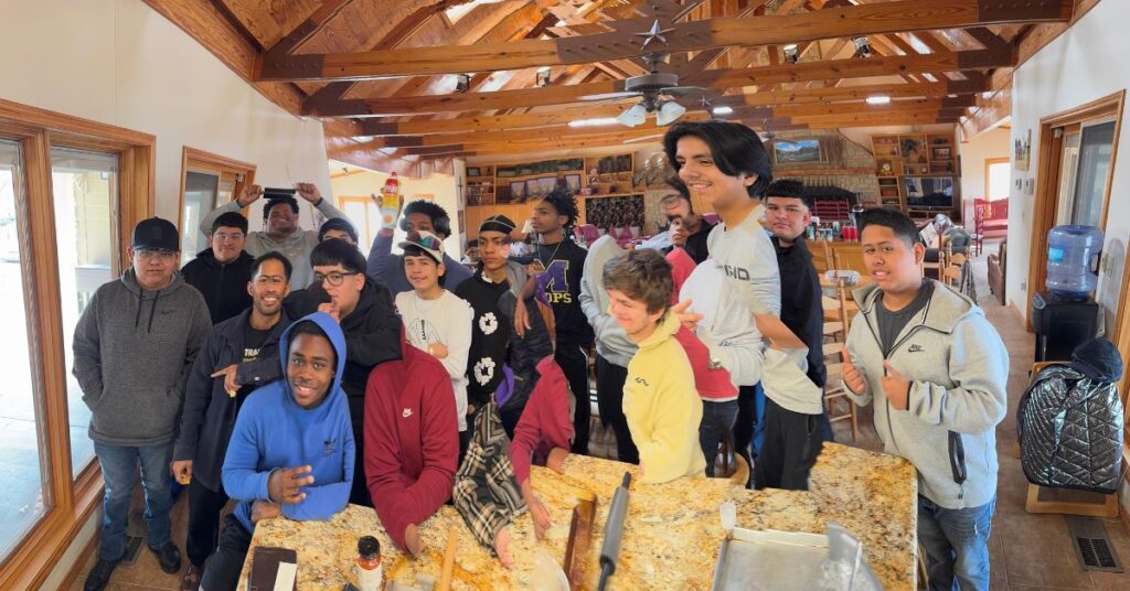 group of men at retreat being silly