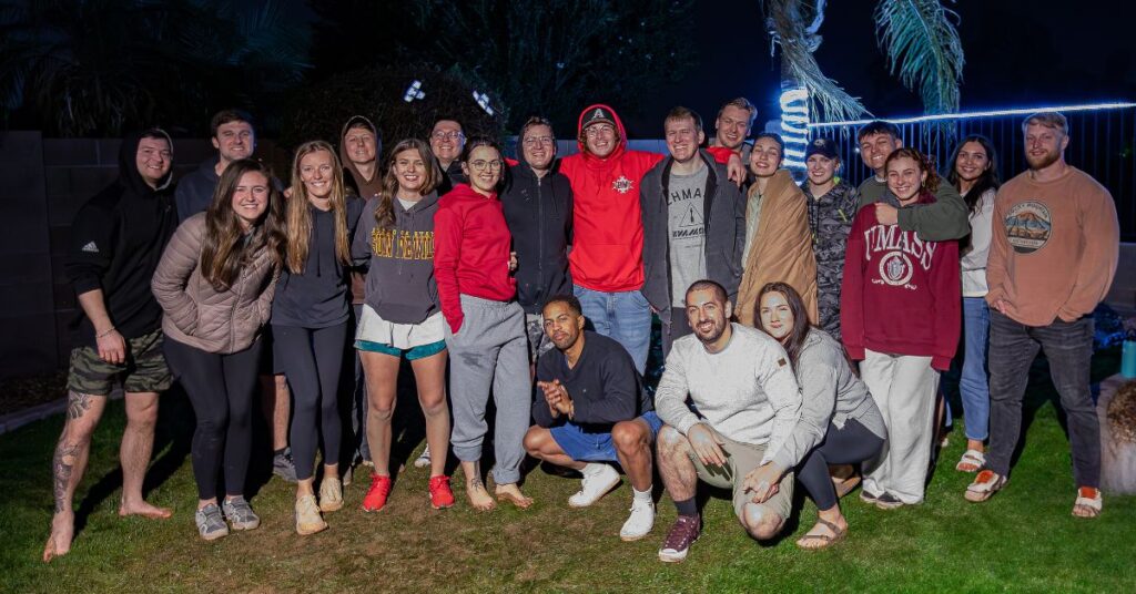 rage cage beer game after photo of everyone