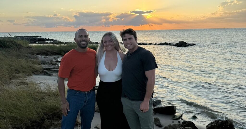 three friends at ocracoke during a sunset
