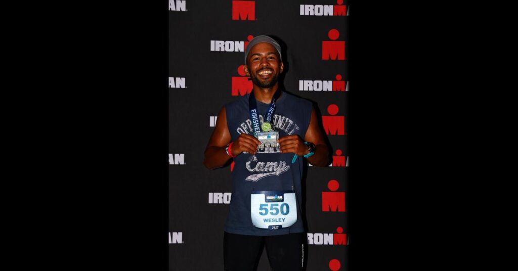 ironman 2025 Chattanooga holding medal