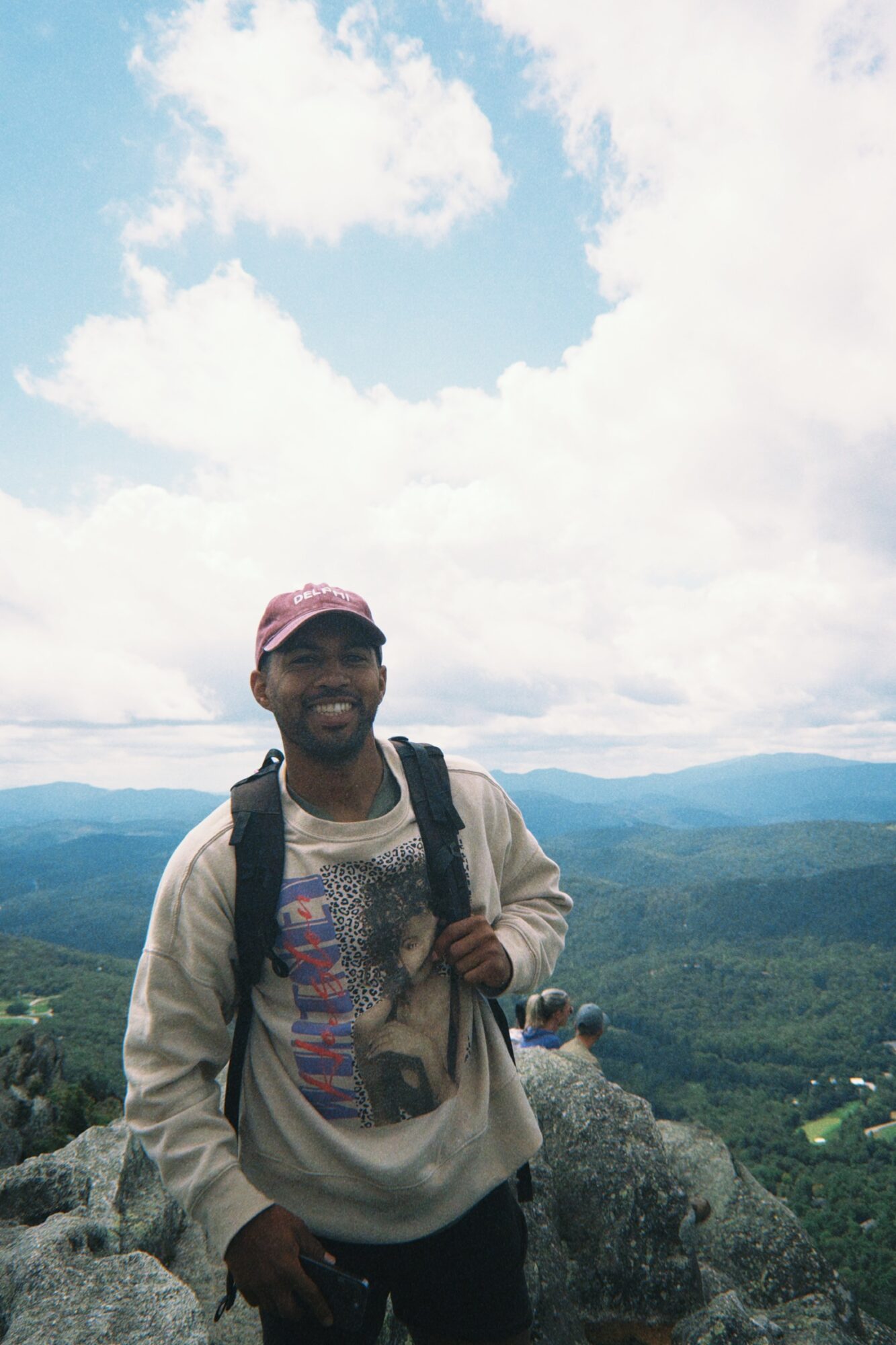 smiling at you with the mountains of North Carolina behind my back